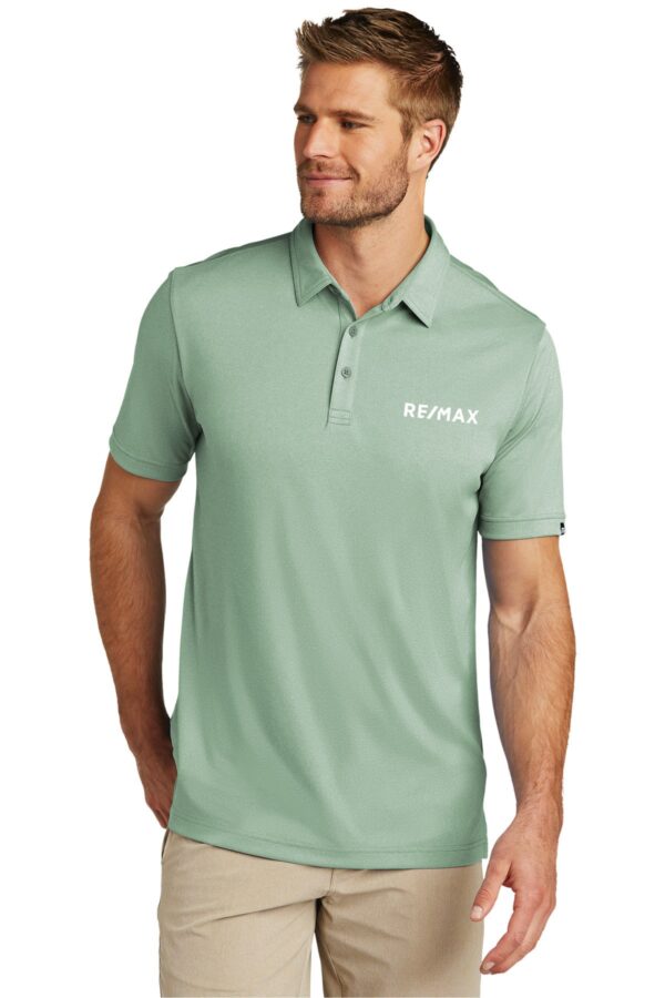 RE/MAX TravisMathew Coto Performance Polo